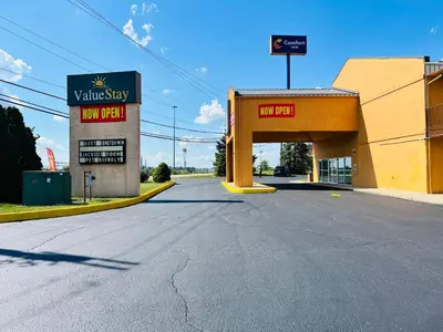 a view of a gas station with a view of a road at Value Stay in Winchester