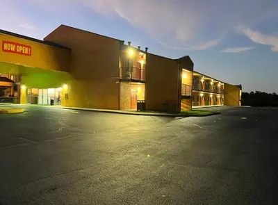 an empty parking lot in front of a building at Value Stay in Winchester