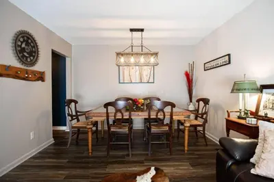 a dining room with a table and chairs at The General's Quarters in Defiance