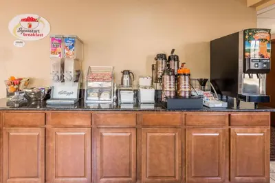 a kitchen with a counter top with a coffee maker at Super 8 By Wyndham Franklin/Middletown Area in Middletown