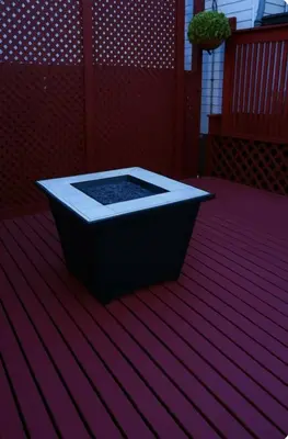 a black tub sitting on top of a red floor at Spacious Three Bedroom Parma Home Sleeps six Near Cleveland in Parma
