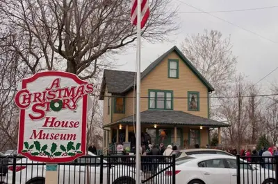 a christmas show sign in front of a house at Cozy Bungalow 10 Min to DTWN CLE in Euclid