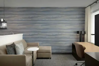 a living room with a couch and a table at Residence Inn by Marriott Dayton Miamisburg in Miamisburg