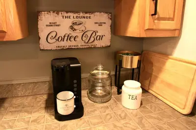 a coffeemaker and a coffee maker on a kitchen counter at The Lounge - Downtown Chillicothe in Chillicothe