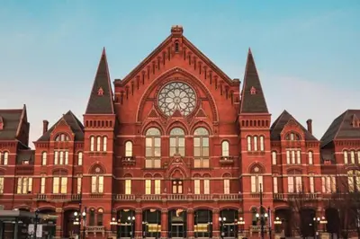 a large red brick building with a clock on it at Top Rated - Free Parking - 1-br Condo OTR in Cincinnati