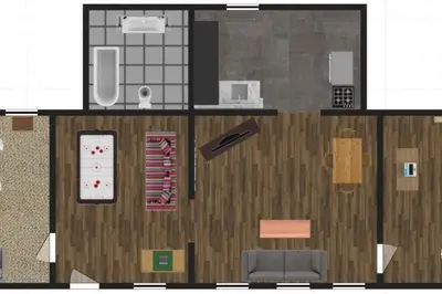 a floor plan of a living room with a couch at Stylish King Bed, 2BDRM, 1 Mile to DTWN, Game Room in Cleveland