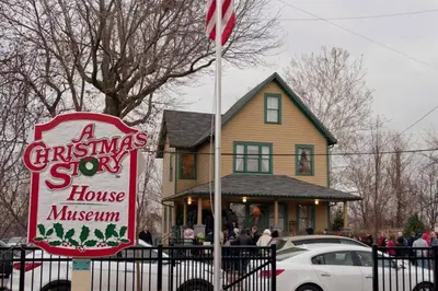 a christmas store sign in front of a house at Stylish King Bed, 2BDRM, 1 Mile to DTWN, Game Room in Cleveland