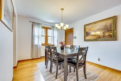 a dining room with a table and chairs at 11 Mi to Dtwn Columbus Group Retreat with Fire Pit! in Worthington