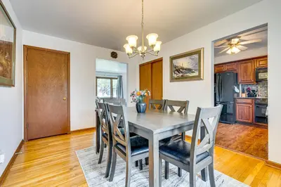 a dining room with a table and chairs at 11 Mi to Dtwn Columbus Group Retreat with Fire Pit! in Worthington