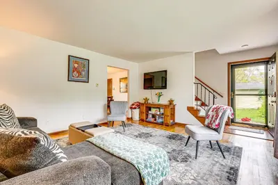 a living room with a couch and two chairs at 11 Mi to Dtwn Columbus Group Retreat with Fire Pit! in Worthington