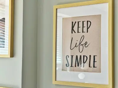 a picture of a keep life simple sign on a wall at Boho Studio Loft Meets Luxury in OTR Cincinnati! in Cincinnati