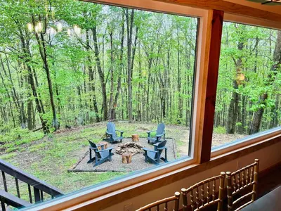 a view of a screened in porch from a window at Game RoomHot Tub4mi to Rock HouseGives Back! in Laurelville
