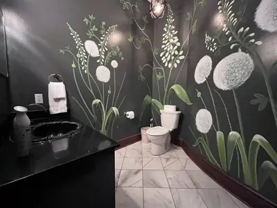 a bathroom with a flower mural on the wall at 12,700 sf 8 Room Mansion on 18 acres in Medina