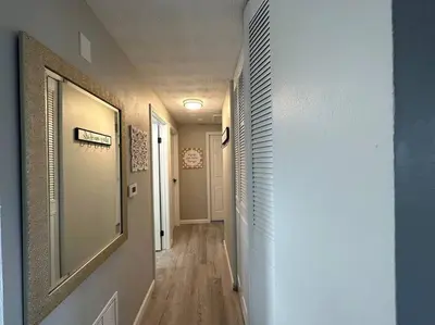 an empty hallway with a hallwayngthngthngthngthngthngthngthngthngthngth at Modern Retreat - Newly Remodeled Gem in Englewood
