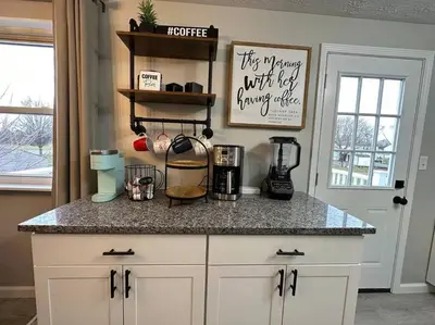 a kitchen with a counter with a coffee maker on it at Modern Retreat - Newly Remodeled Gem in Englewood
