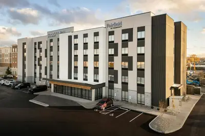 a large building with a parking lot in front of it at TownePlace Suites by Marriott Cincinnati Oakley in Cincinnati