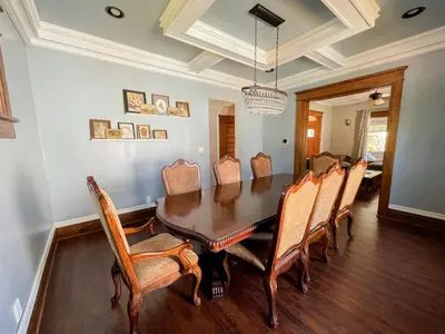 a dining room with a table and chairs at 4BR-Beautiful Historic Home in Millersburg