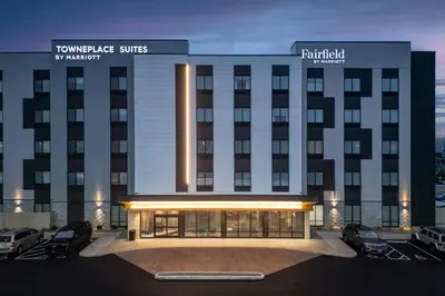 a rendering of the front of a hotel at Fairfield by Marriott Inn & Suites Cincinnati Oakley in Cincinnati