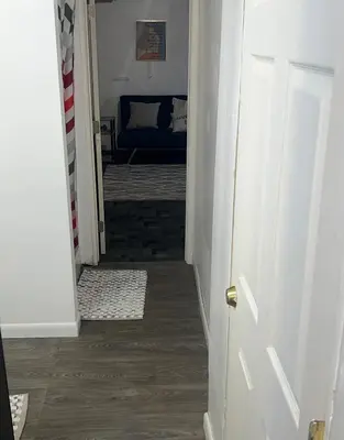 an open door to a room with a bed at The Cozy Corner in Toledo