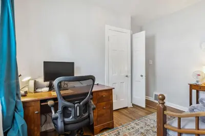 an office with a desk with a computer and a chair at Near CLE Clinic - Long term stays accepted in Shaker Heights