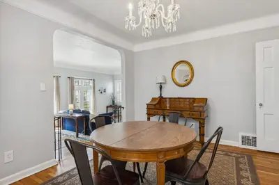 a dining room with a table and chairs at Near CLE Clinic - Long term stays accepted in Shaker Heights