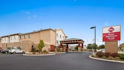 a best western plus sign in front of a parking lot at Best Western Plus Boardman Inn & Suites in Poland