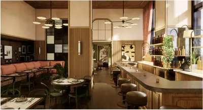 a restaurant with tables and chairs and a bar at Fidelity Hotel in Cleveland