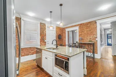 a kitchen with a sink and a counter top at The Beer Baron House - Rhinegeist - FREE Streetcar in Cincinnati
