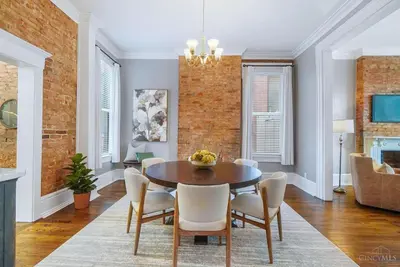 a dining room with a table and chairs at The Beer Baron House - Rhinegeist - FREE Streetcar in Cincinnati