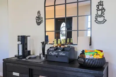 a table with a coffee shop on top of it at Rocky river Escape in Cleveland