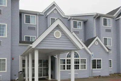 a large house with a gambrel at Quality Inn & Suites Caldwell I-77 in Caldwell