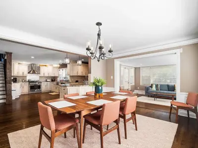 a kitchen and dining room with a table and chairs at Shaker Prestige - 4 000 sq ft - Calm and Quiet in Shaker Heights