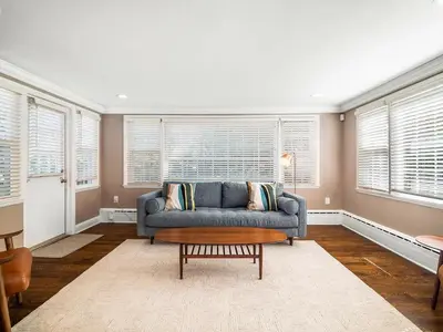 a living room with a couch and a coffee table at Shaker Prestige - 4 000 sq ft - Calm and Quiet in Shaker Heights