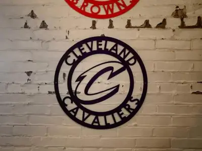 a sign on a brick wall that says cevillianarma at Lakefront Loft - Walk 2 First Energy x Progressive in Cleveland