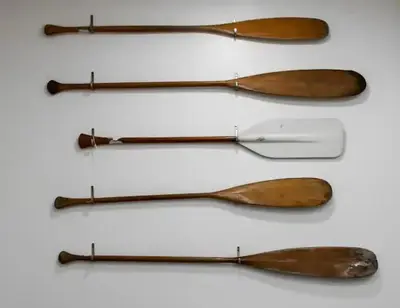 a group of four wooden spoons on a white background at Spacious Riverfront Suite - Close to Downtown in Cleveland