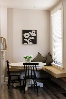 a dining room with a table and two chairs at Lizzys Haven in Cincinnati