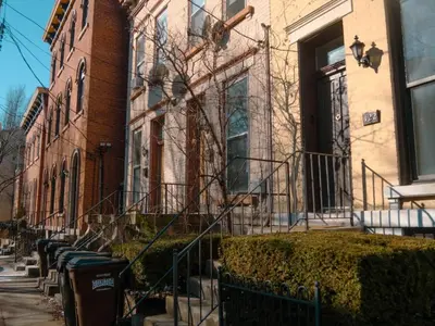 a building with a staircase in front of it at 2 Blocks from TQL Stadium 2BR 1.5BA in Cincinnati