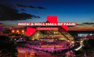 a building with a crowd of people in front of it at Spacious Downtown Sq Stadium, Casino, R&R HoF in Cleveland