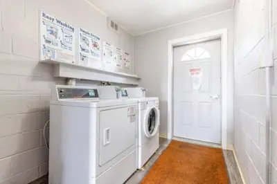 a white laundry room with a washer and dryer at Heights Dream Libby Unit 6 in Maple Heights