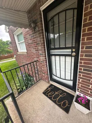 a door with a welcome mat in front of a house at Akron Abode - 2pm Check In & Out in Akron