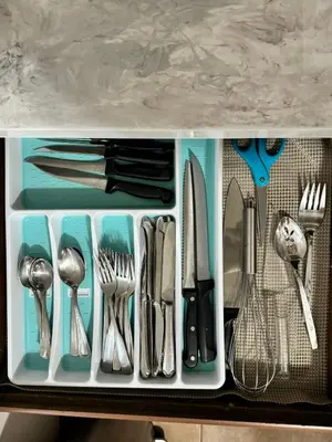 a tray of utensils sitting on a table at Beautiful 2 BDRM Ocean Inspired Oasis in Youngstown