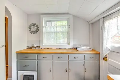 a kitchen with a sink and a window at Large Yard and Fire Pit Pet-Friendly Ravenna Home! in Streetsboro