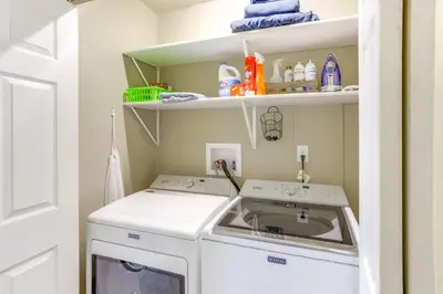 a laundry room with a washer and dryer at 5 Mi to Lake Port Clinton Home with Gazebo and Grill! in Port Clinton