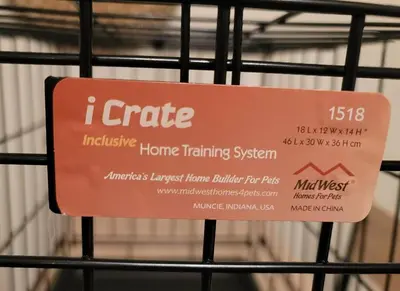 a sign on a fence that reads i create inclusive home training system at Joyful Bright1-BR , Fenced Pet Friendly Yard With Garage in Dayton