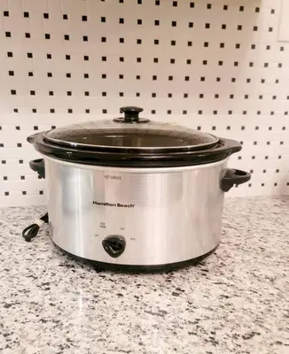 a slow cooker sitting on a kitchen counter at Joyful Bright1-BR , Fenced Pet Friendly Yard With Garage in Dayton