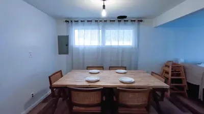 a dining room with a wooden table and chairs at Entire House in Twinsburg in Twinsburg