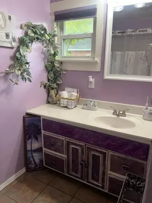 a bathroom with a sink and a mirror at Pendleton Getaway in Pendleton