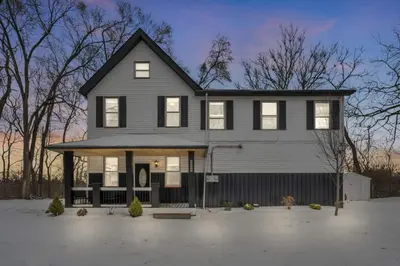 a gray house with a black roof at Modern Luxury in Tremont - 6Bed 3bath Fee parking in Cleveland