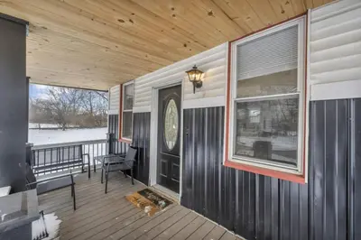 a porch of a house with a wooden ceiling at Modern Luxury in Tremont - 6Bed 3bath Fee parking in Cleveland