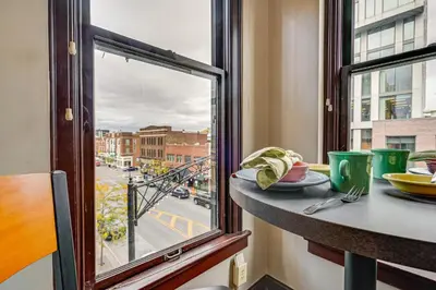 a window with a view of a city street at Walk to Convention Center, Secured Apt in Columbus in Columbus